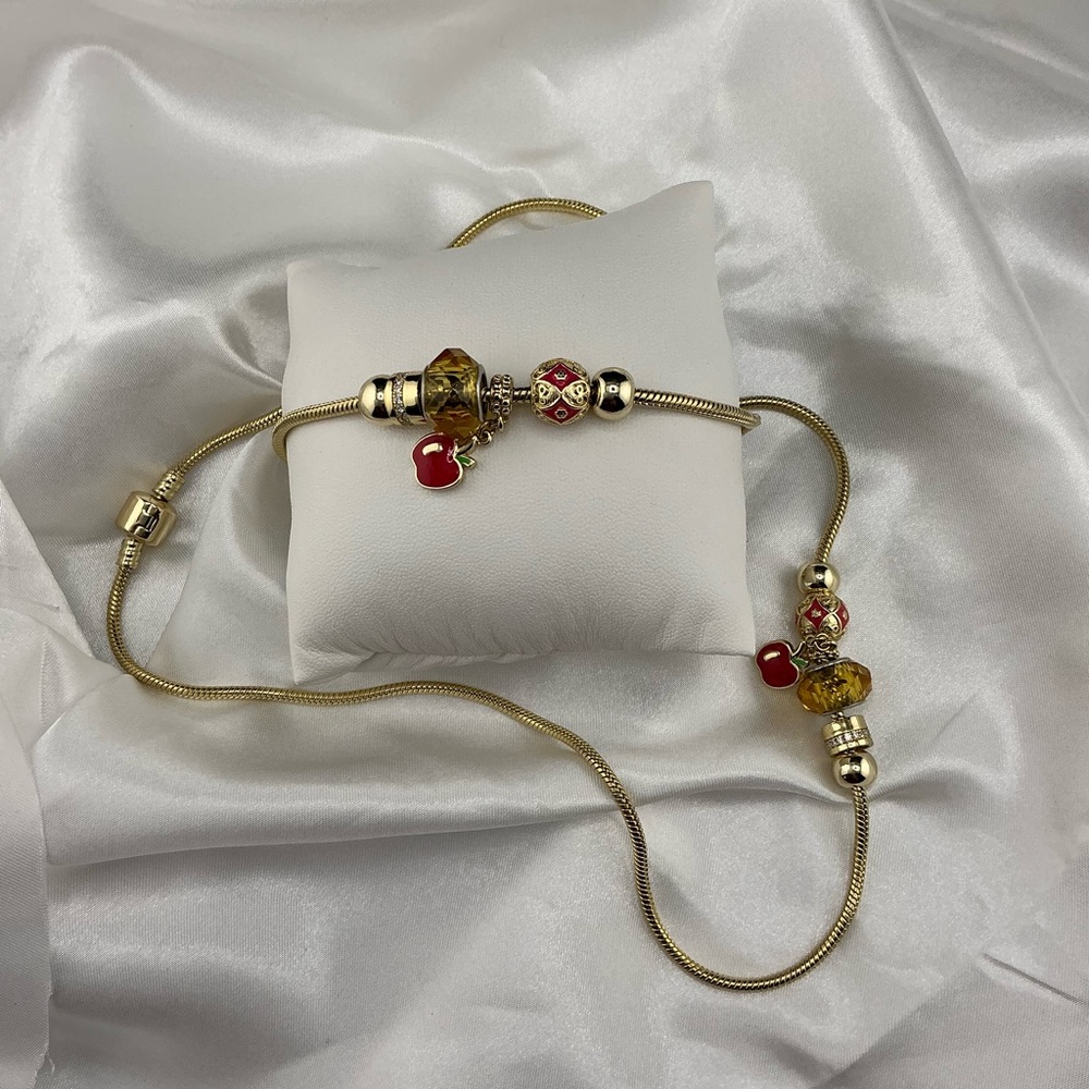 Gold and Red Charm Bracelet